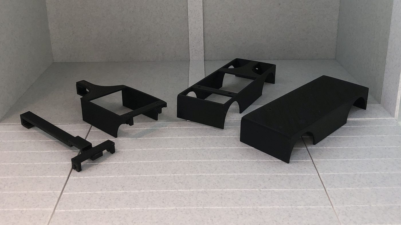 The four versions in black, left to right: spine rail, short shell, long shell, enclosed platform.